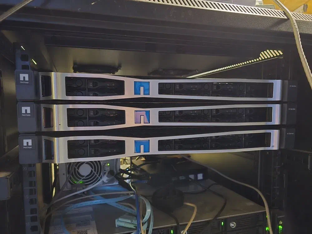 Network Rack with 3 Servers showing NetApp badges on them
